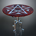 Round Table With Red Tabletop Featuring White Pentagram Pattern And Silver Metal Legs