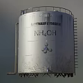 Silver Industrial Storage Tank With Ladder Top Railing Base Supports And Yellow Warning Label