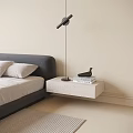 Modern Floating Nightstand In Minimalist Bedroom With Gray Headboard Black Table Lamp Stack Of Books And Decorative Bird