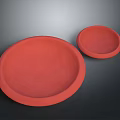 Household Items Two Different Sizes Red Round Plates With Smooth Surface