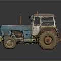 Vintage Blue Tractor with Orange Warning Light and Muddy Farm Tires