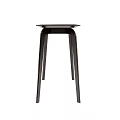 Modern Sleek Dark Colored Dining Table With Curved Legs And Minimalist Design
