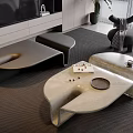 Modern Coffee Tables With Marble Top And Black Curved Design On Grey Rug With Armchair
