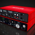Red Focusrite Audio Interface With Stacked Design Knobs Ports And Indicator Lights