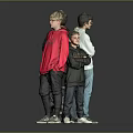 Four Boys Standing Back to Back With Colorful Jackets Against Gray Background