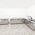 Three Stainless Steel Chest Freezers in White Room with Marble Floor and Open Lid