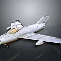 Vintage Silver Fighter Jet Model With Detailed Cockpit And Landing Gear On Dark Background