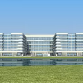 Modern Multi Storey Industrial Factory Building With Glass Curtain Walls Water Reflection And Green Lawn