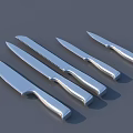 Stainless Steel Kitchen Knife Set With Various Blade Types Arranged In Row