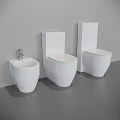 Sleek Modern White Toilet In Bathroom With Sink And Wall Fixtures