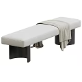 Modern Light Upholstered Sofa Bench With Black Legs And Throw Blanket