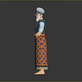 Man Wearing Traditional Blue And Orange Patterned Costume With Headscarf And Arms Outstretched