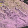 Natural Rocky Terrain Featuring Layered Rock Formations Cliffside Vegetation And Caves