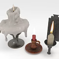 Candle Holders With Lit Candles Melted Wax And Various Decorative Bases