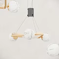 Modern Minimalist Chandelier With White Globe Lamps And Black Gold Metal Frame