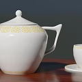 White Ceramic Teapot And Teacup With Yellow Pattern On Wooden Table 3d model