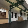 Traditional Railway Station Building At Night With Square Benches Street Lamps And Carriage
