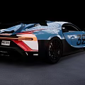 Blue Bugatti Sports Car With Number 32 Streamlined Body And Black Wheels