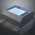 Black Square Electronic Device With White Label Text Metal Mounting Holes And Side Ventilation Slots