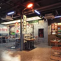Chinese Style Restaurant Interior With Decorative Signs Wooden Tables And Hanging Lights