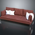 Modern Brown Leather Three-Seater Sofa with White Cushions and Blanket on Metal Legs