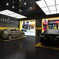 4S Dealership Car Service Workshop With Two Cars Yellow Service Tools And Bright Lighting