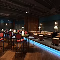 Modern Bar Interior With Wooden Bar Counter Dining Tables Colorful Lighting And TV Screens