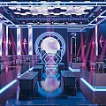 Modern KTV Lounge Interior With Neon Lights Geometric Decor Bar Counter And Seating Area