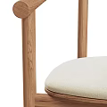 Modern Single Chair Featuring Wooden Frame And Soft Light Colored Cushion 3d model