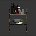 Brass Bar Cart With Wine Bottles Shakers And Glasses On Metal Shelves