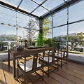 Villa Balcony with Glass Enclosure Wooden Flooring and Dining Table Chairs Overlooking Green Trees