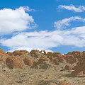 Breathtaking Red Rock Landscape With Blue Sky White Clouds And Natural Rock Formations