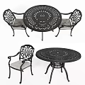 Outdoor Table with Ornate Metal Design and Matching Chairs Gray Cushions