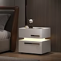 Modern White Bedside Table In Bedroom With Drawers And Built in Lighting Next To Bed