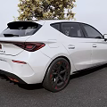 White Sporty Hatchback Car Parked On Gray Asphalt With Black Rims Near Yellow Leaf Tree