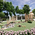 Scenic Water Fountain in Outdoor Park with Green Lawn Pink Flowers and Playground