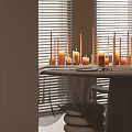 Modern Warm Minimalist Restaurant With Elegant Candle Decor And Soft Ambient Lighting For Cozy Dining Moments