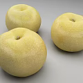 Three Fresh Yellow Pears With White Spots On Gray Background