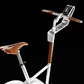 Modern Stationary Bike With Silver Frame Brown Leather Seat And Wooden Handles