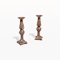 Pair Of Ornate Brass Candle Holders With Intricate Carved Design