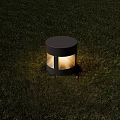 Round Outdoor Light Illuminated On Grass With Warm Glow And Glass Panel
