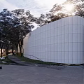 Garden Landscape Design Featuring Curved Stone Pathway Trees And Modern Architecture