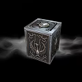Mystical Metal Cube With Intricate Carvings And Decorative Top Surrounded By Smoke
