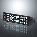 Television Set With Black Remote Control Featuring Multiple Function Buttons For TV