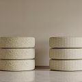 Beige Stacked Stools With Textured Design In Minimalist Interior Smooth Floor