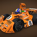 Orange Racing Car With Beta Branding Helmet Tires And Number 8