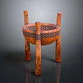 Traditional Wooden Storage Container With Four Cylindrical Legs And Decorative Woven Pattern