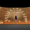YY2021 Annual Ceremony Scene With Golden Tassel Backdrop Woman In Black Dress And Decorative Balls