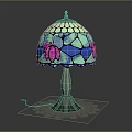 Stained Glass Table Lamp With Pink And Blue Floral Patterns Silver Base And Lace Trim