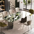 Modern Dining Table Set With Marble Patterned Top Beige Green Chairs And Fruit Decoration